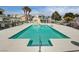 Relaxing community pool with a spacious deck at 8945 Clairton Ct, Las Vegas, NV 89117