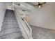 Gray carpeted staircase leading to an upper loft area at 8945 Clairton Ct, Las Vegas, NV 89117