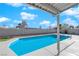 Sparkling pool with patio cover for shade at 905 Antelope Way, Las Vegas, NV 89145