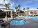 Refreshing community pool and spa with comfortable seating area at 950 Seven Hills Dr # 2413, Henderson, NV 89052