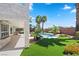 Expansive backyard with a pool and lush landscaping at 9523 Castillana Ct, Las Vegas, NV 89147