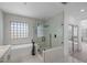 Spa-like bathroom with a soaking tub and walk-in shower at 9523 Castillana Ct, Las Vegas, NV 89147