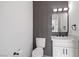 Modern powder room with updated vanity and fixtures at 9523 Castillana Ct, Las Vegas, NV 89147