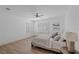 Bedroom with wood floors, ceiling fan, and window shutters at 9523 Castillana Ct, Las Vegas, NV 89147