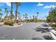 Gated community entrance with landscaping and signage at 9523 Castillana Ct, Las Vegas, NV 89147