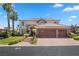 Two-story home with stone accents and three-car garage at 9523 Castillana Ct, Las Vegas, NV 89147