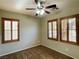 Bedroom with ceiling fan and plantation shutters at 1175 Lake Berryessa St, Henderson, NV 89002