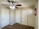 Bedroom with triple closets and ceiling fan at 1175 Lake Berryessa St, Henderson, NV 89002