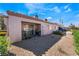 Backyard view of patio, landscaping, and exterior at 1431 Di Blasi Dr # 105, Las Vegas, NV 89119
