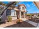 Charming stucco home with a Spanish-style design and well-maintained landscaping at 1431 Di Blasi Dr # 105, Las Vegas, NV 89119