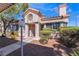 Charming stucco home with a Spanish-style design and well-maintained landscaping at 1431 Di Blasi Dr # 105, Las Vegas, NV 89119