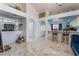 Open kitchen with breakfast bar and white cabinets at 1431 Di Blasi Dr # 105, Las Vegas, NV 89119