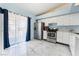 Bright kitchen with stainless steel appliances and marble floors at 1431 Di Blasi Dr # 105, Las Vegas, NV 89119