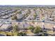 Aerial view showing a house with solar panels in a residential area at 1466 Fieldbrook St, Henderson, NV 89052