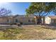 Open backyard with a covered patio area, offering a great outdoor living space and drought tolerant landscaping at 1466 Fieldbrook St, Henderson, NV 89052