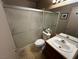 Clean bathroom with shower/tub combo and tile flooring at 2148 Pebble Creek Ln, Laughlin, NV 89029