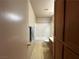 Bathroom with tub, toilet, and wood vanity at 2148 Pebble Creek Ln, Laughlin, NV 89029