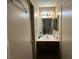 Bathroom boasts a single sink vanity and mirrored medicine cabinet at 2148 Pebble Creek Ln, Laughlin, NV 89029