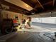 Two-car garage with storage racks and room for tools at 2148 Pebble Creek Ln, Laughlin, NV 89029