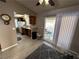 Kitchen with wood cabinets, white appliances, and vinyl flooring at 2148 Pebble Creek Ln, Laughlin, NV 89029