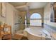 Spa-like bathroom featuring a large soaking tub and a separate shower at 2430 Antler Point Dr, Henderson, NV 89074