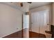 Simple bedroom with wood floors and double door closet at 2430 Antler Point Dr, Henderson, NV 89074