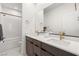 Spa-like bathroom with double vanity and marble floors at 3243 Fountaintree Ave, Henderson, NV 89044