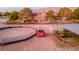 Horse stables, riding arena, and a house in the background at 5353 Dorrell Ln, Las Vegas, NV 89131