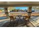 Relaxing back patio with seating area and view of the backyard at 5353 Dorrell Ln, Las Vegas, NV 89131