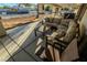 Spacious back patio with a sectional sofa and a coffee table at 5353 Dorrell Ln, Las Vegas, NV 89131