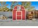 Red barn with a western-themed sign on the front at 5353 Dorrell Ln, Las Vegas, NV 89131