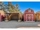 View of multiple barns with a covered area at 5353 Dorrell Ln, Las Vegas, NV 89131