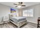 Spacious bedroom with wood-like flooring and a rustic-style bed at 5353 Dorrell Ln, Las Vegas, NV 89131