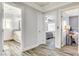 Bright hallway with access to bedrooms and bathrooms at 5353 Dorrell Ln, Las Vegas, NV 89131