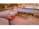 Aerial view of horse stables with covered areas and a horse trailer at 5353 Dorrell Ln, Las Vegas, NV 89131