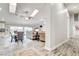 Open concept living and dining area with wood-look floors at 5353 Dorrell Ln, Las Vegas, NV 89131