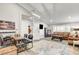 Open living room features a home office and comfortable seating area at 5353 Dorrell Ln, Las Vegas, NV 89131