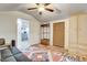 Living area with a pull-out sofa, dresser, and closet at 5353 Dorrell Ln, Las Vegas, NV 89131