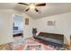 Living room with a pull-out sofa and a view into a bedroom at 5353 Dorrell Ln, Las Vegas, NV 89131