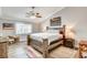 Large main bedroom with a king-size bed and high ceilings at 5353 Dorrell Ln, Las Vegas, NV 89131