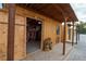 Rustic western-themed room with wood walls and general store backdrop at 5353 Dorrell Ln, Las Vegas, NV 89131