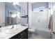 Bathroom with tub/shower combo and dark vanity at 5455 San Florentine Ave, Las Vegas, NV 89141