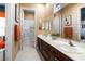 Bathroom with double vanity and a tub shower combo at 5455 San Florentine Ave, Las Vegas, NV 89141