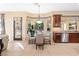 Cozy breakfast nook with backyard views and access to the outdoor spaces at 5455 San Florentine Ave, Las Vegas, NV 89141