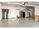 Finished garage with overhead storage and epoxy flooring at 5455 San Florentine Ave, Las Vegas, NV 89141