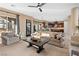 Inviting living room featuring a neutral color palette, plush seating, and seamless access to other areas at 5455 San Florentine Ave, Las Vegas, NV 89141