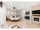 Main bedroom with king bed, fireplace, kitchenette, and sitting area at 5455 San Florentine Ave, Las Vegas, NV 89141