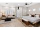 Large main bedroom with king bed, sitting area, and private door access at 5455 San Florentine Ave, Las Vegas, NV 89141
