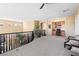 Spacious office with built-in desk, bookcase, and balcony view at 5455 San Florentine Ave, Las Vegas, NV 89141