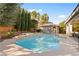 Inviting pool with spa and a well-landscaped backyard at 5455 San Florentine Ave, Las Vegas, NV 89141